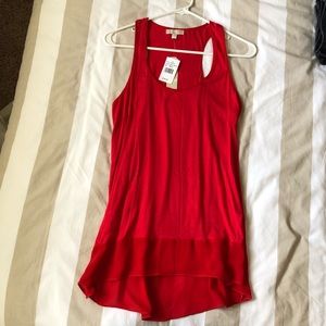 Red sleeveless blouse